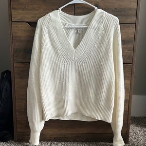 NWOT white v-neck sweater in brand new condition!